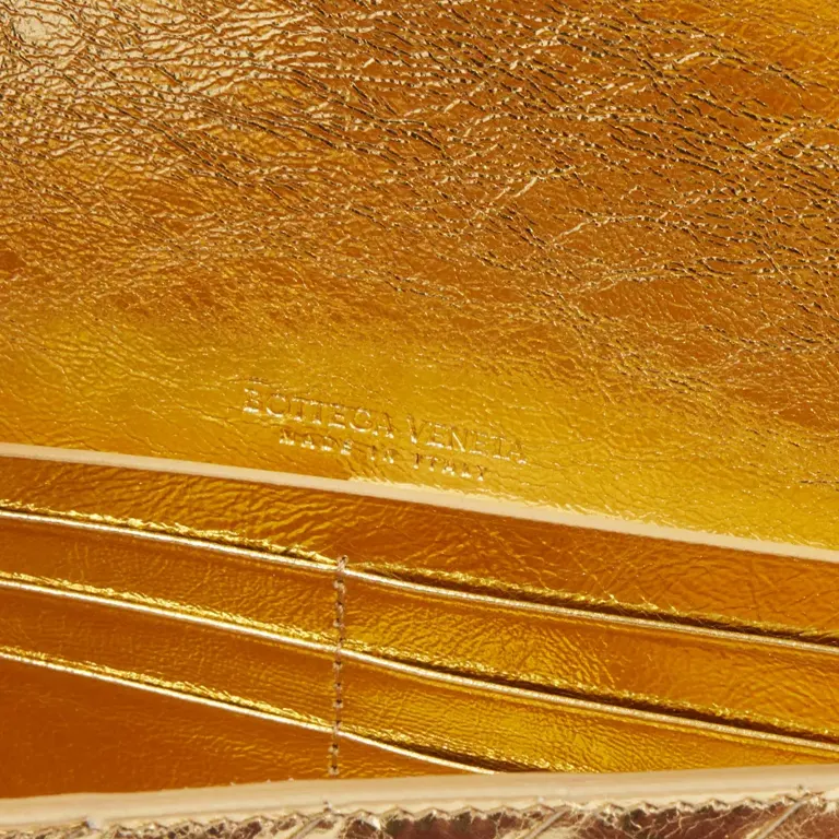 Andiamo Leather Clutch Bag gold open