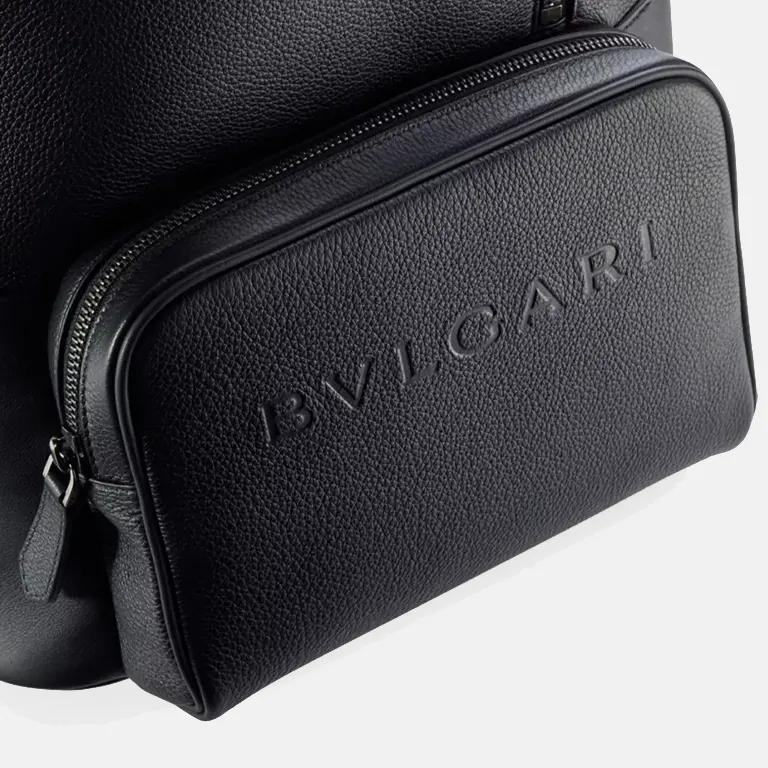 Logo-embossed leather backpack zipper