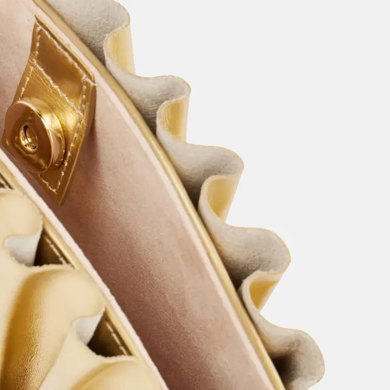 Nala pleated metallic-leather clutch bag close