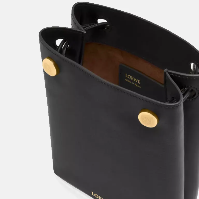 Pebble branded leather cross-body pouch open