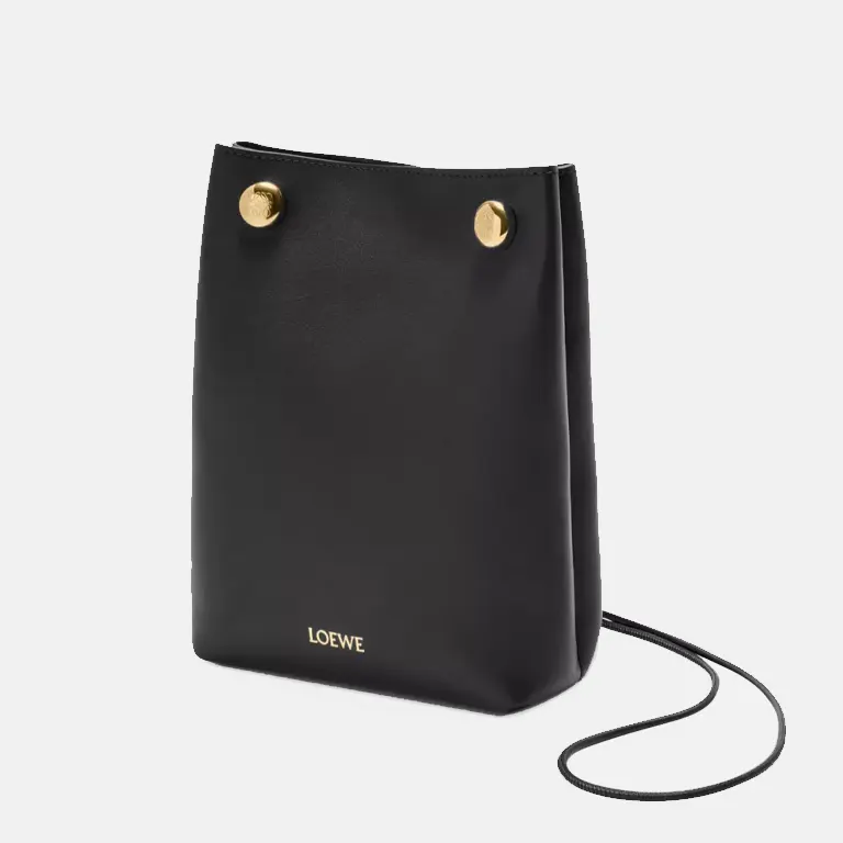 Pebble branded leather cross-body pouch side