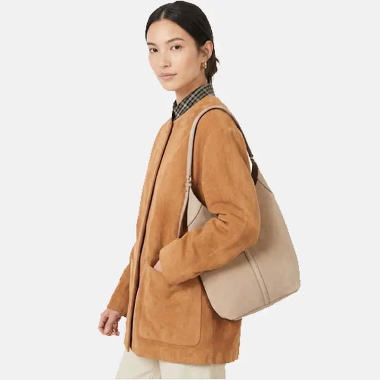 The Siena Suede Bucket Bag hand